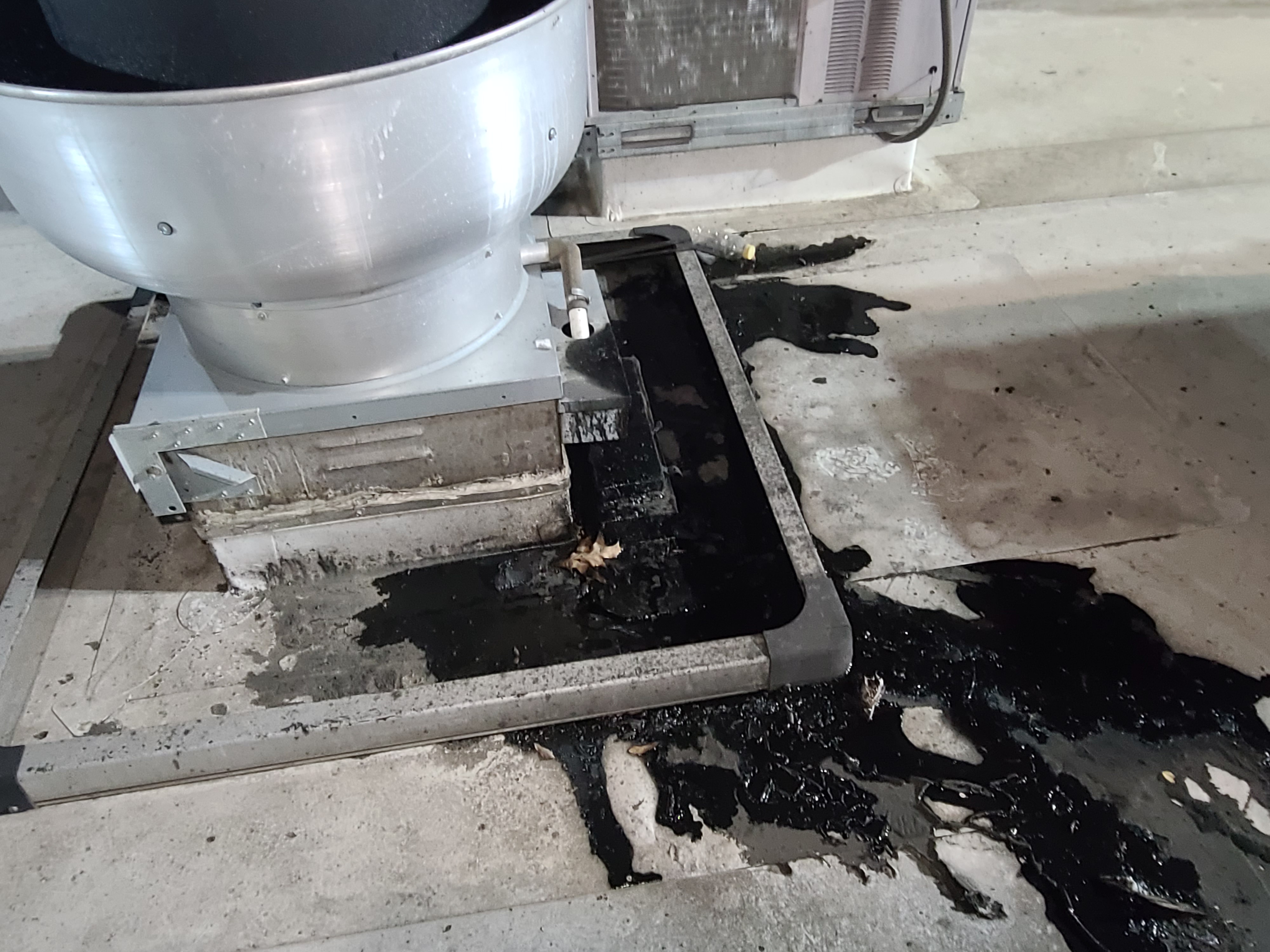 roof exhaust fan leaking grease all over roof